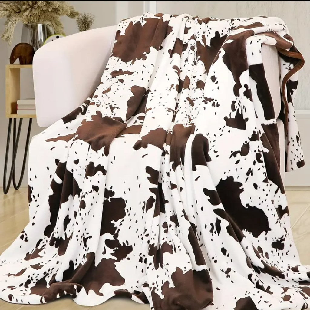 Brown cow print throw